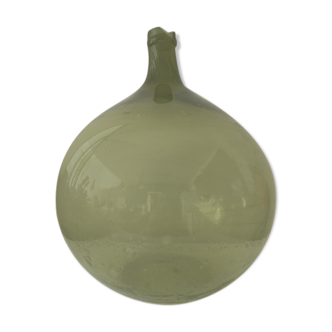 Old demijohn full of bubbles