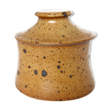 Handmade and rustic water butter in pyrity sandstone