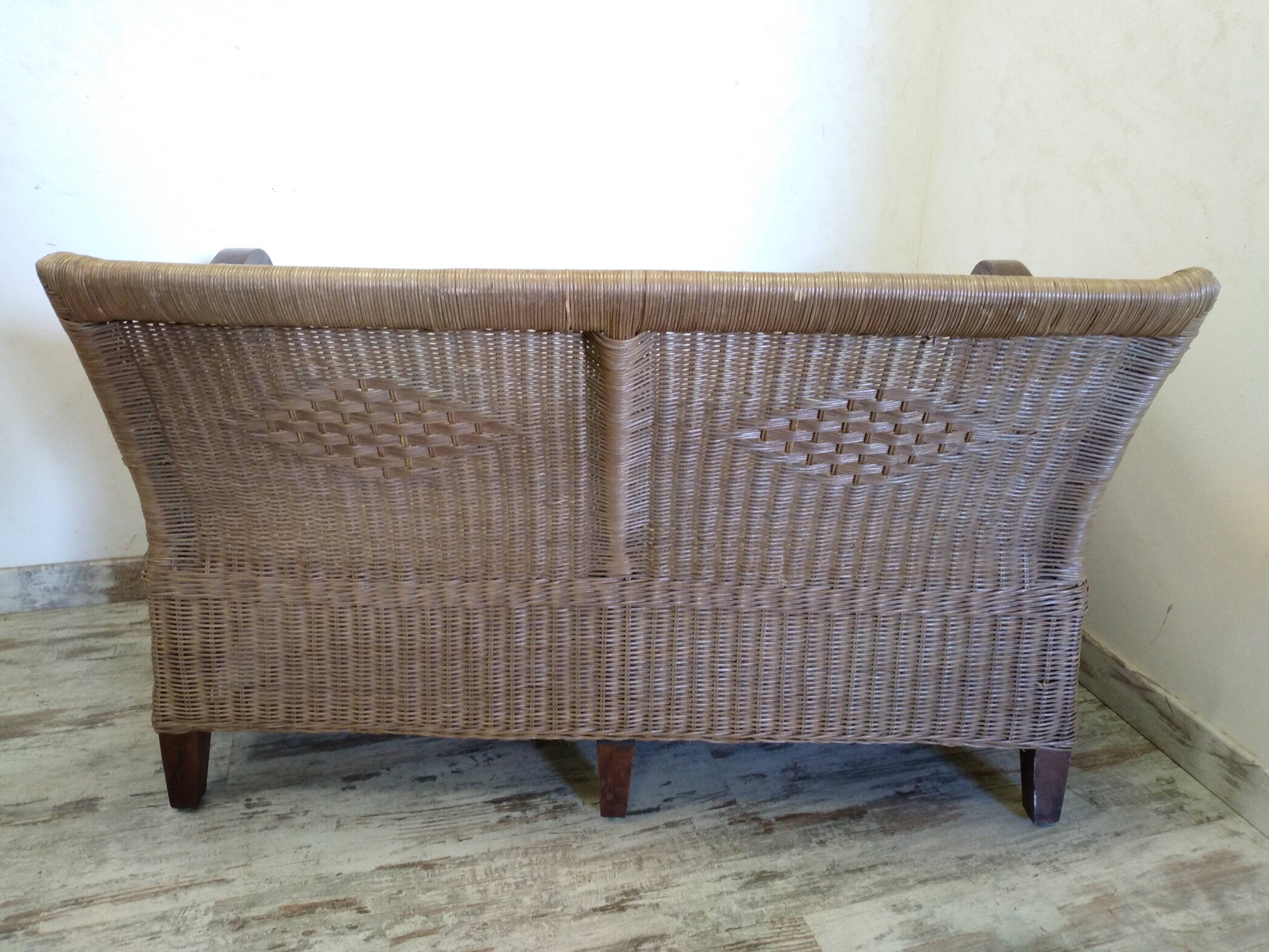 Bench seat and armchair in old rattan