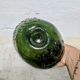 Oval green demijohn