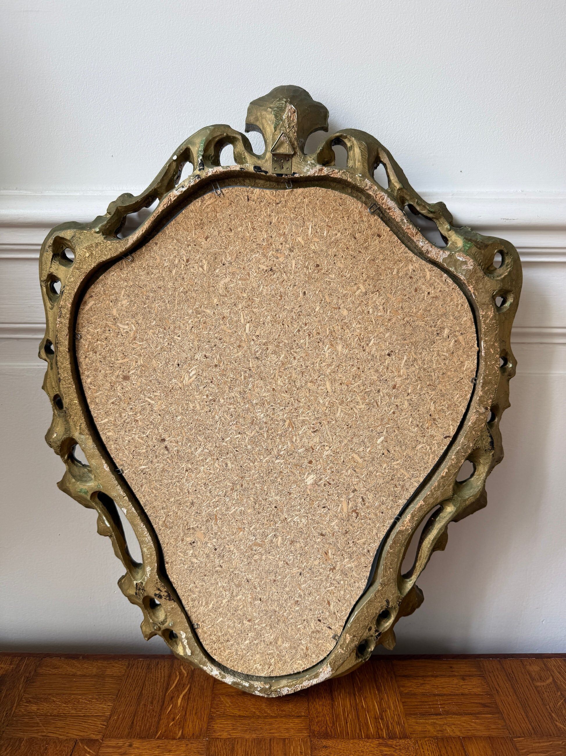 Golden rococo wall mirror