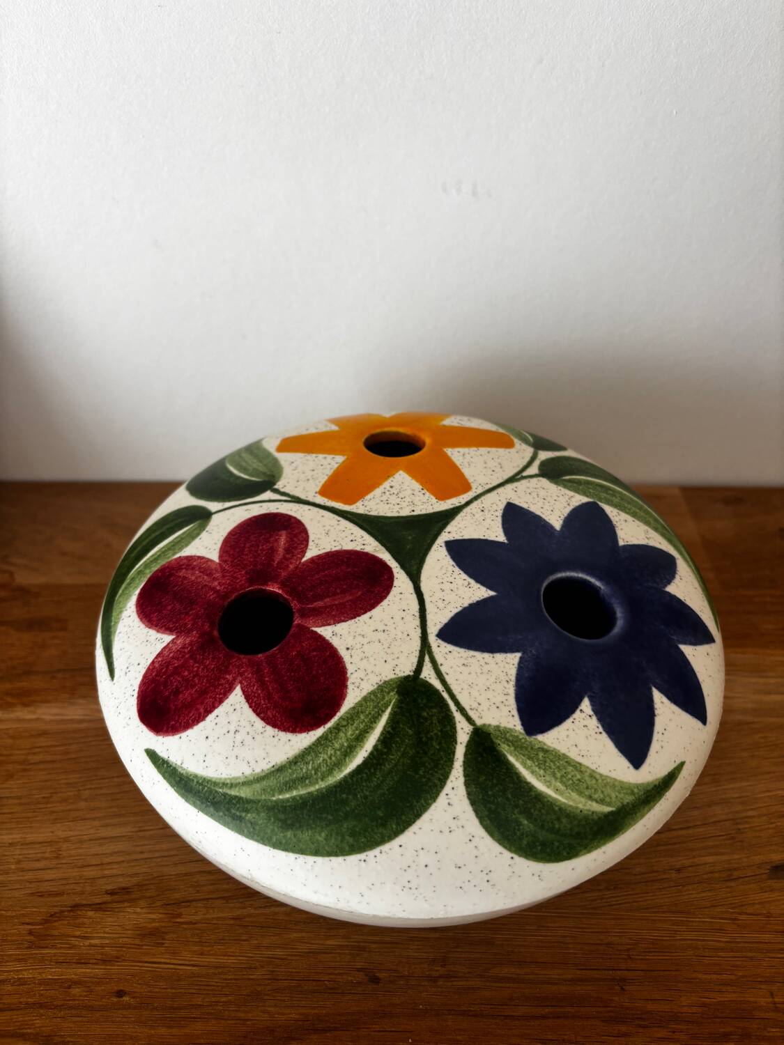 Charming vintage ceramic flower vase with floral decoration from the 1970s.