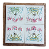 Antique earthenware and wood trivet