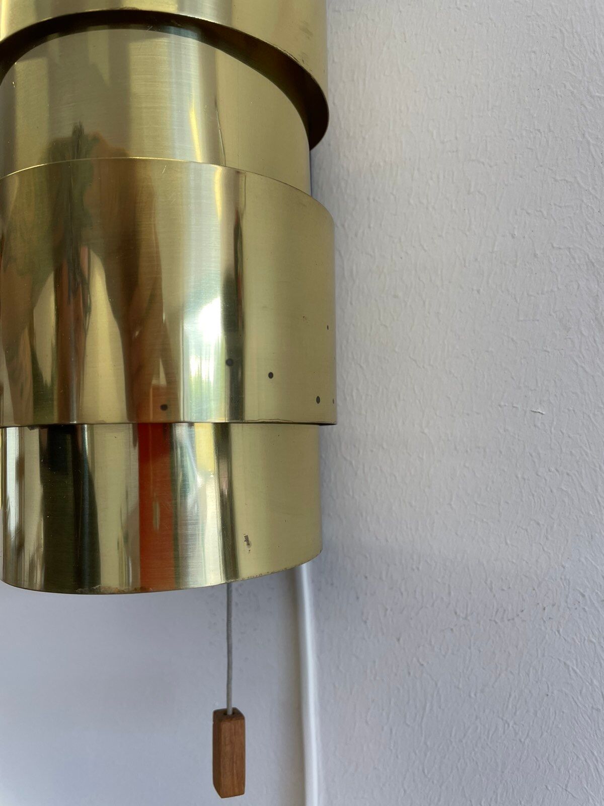 Pair of Scandinavian teak and brass sconces