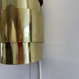 Pair of Scandinavian teak and brass sconces