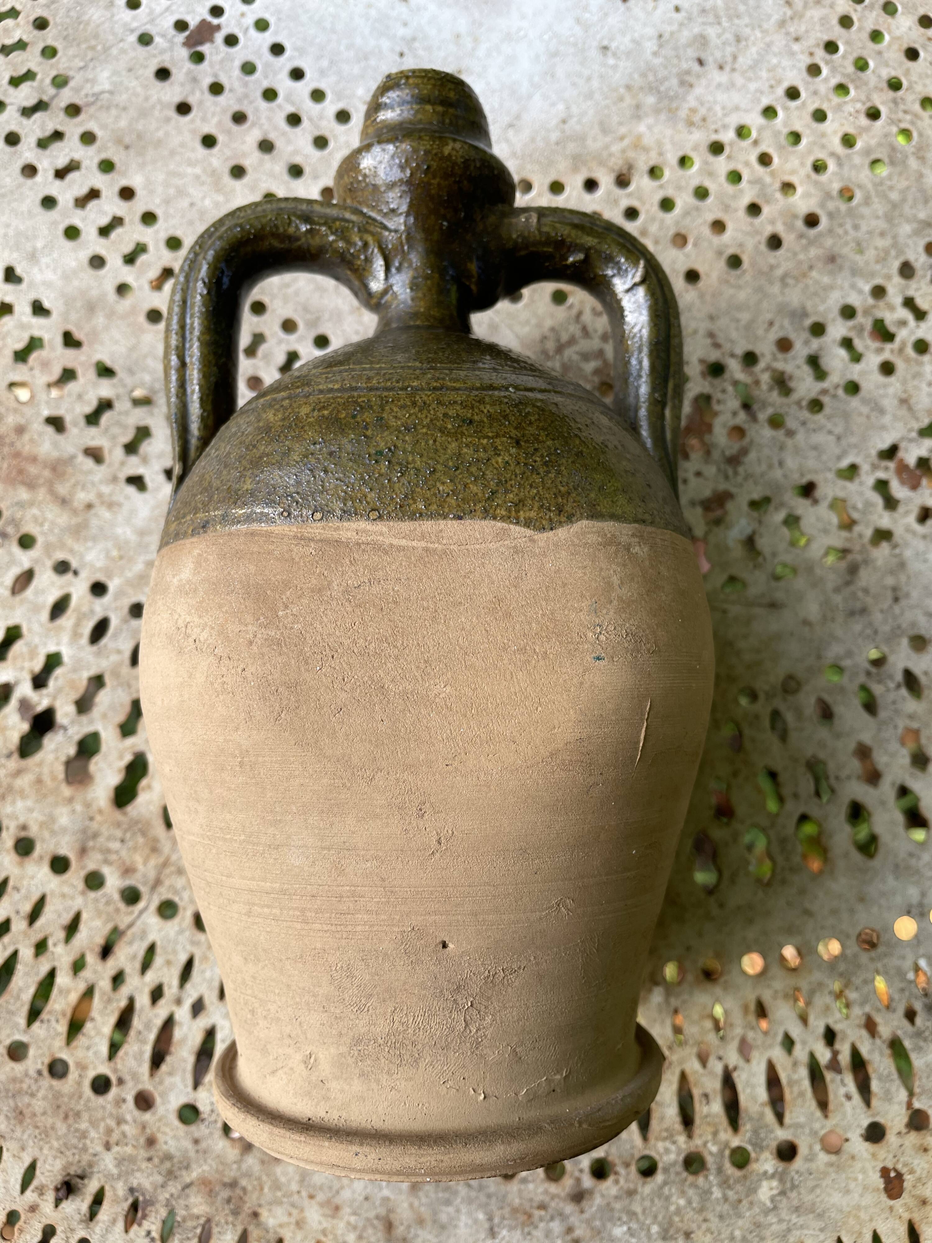 Persimmon glazed terracotta oil jar