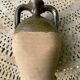 Persimmon glazed terracotta oil jar