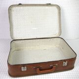 Cardboard and brown leather case