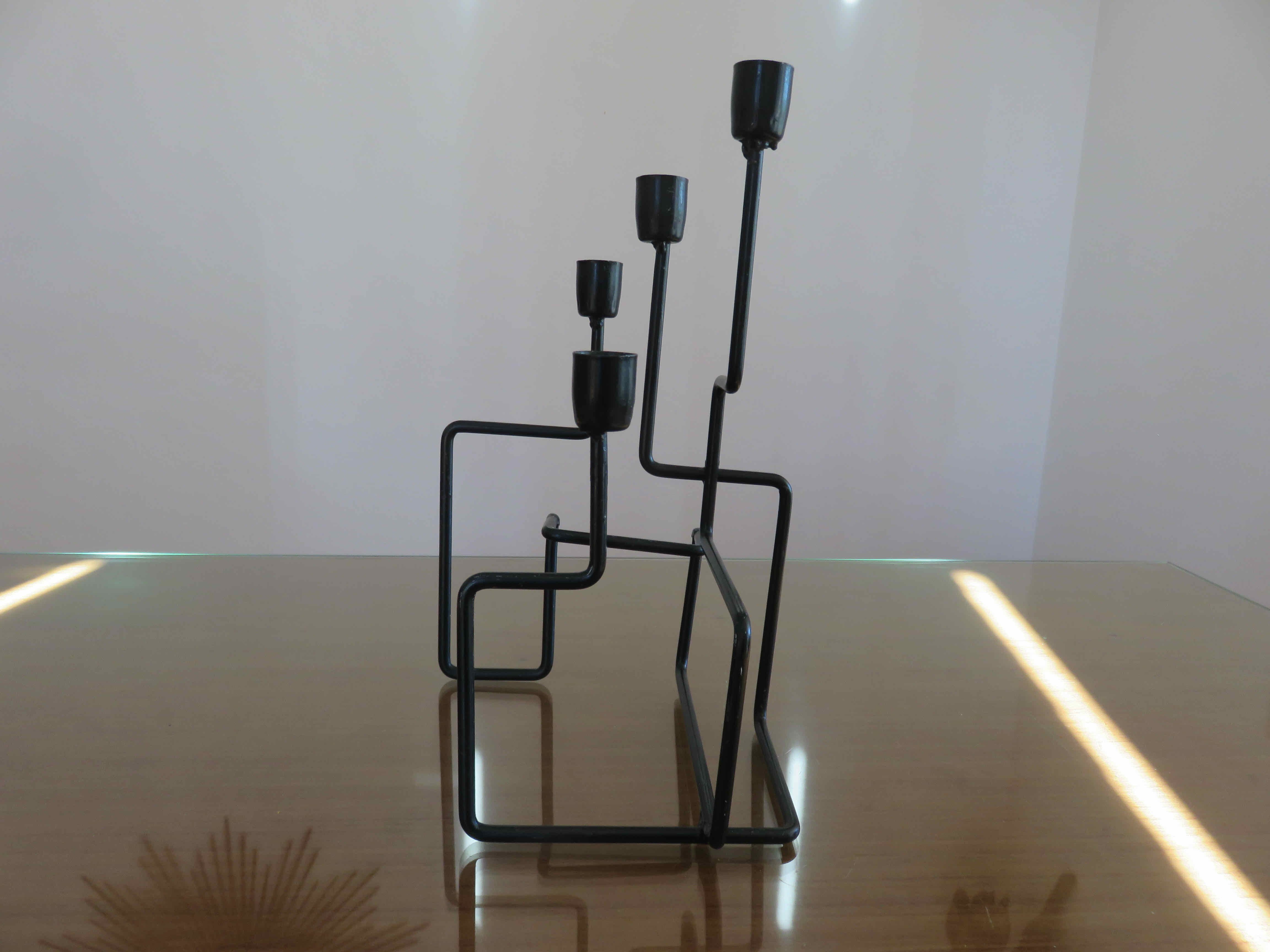 Modernist candle holder in black lacquered metal 1990