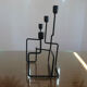 Modernist candle holder in black lacquered metal 1990