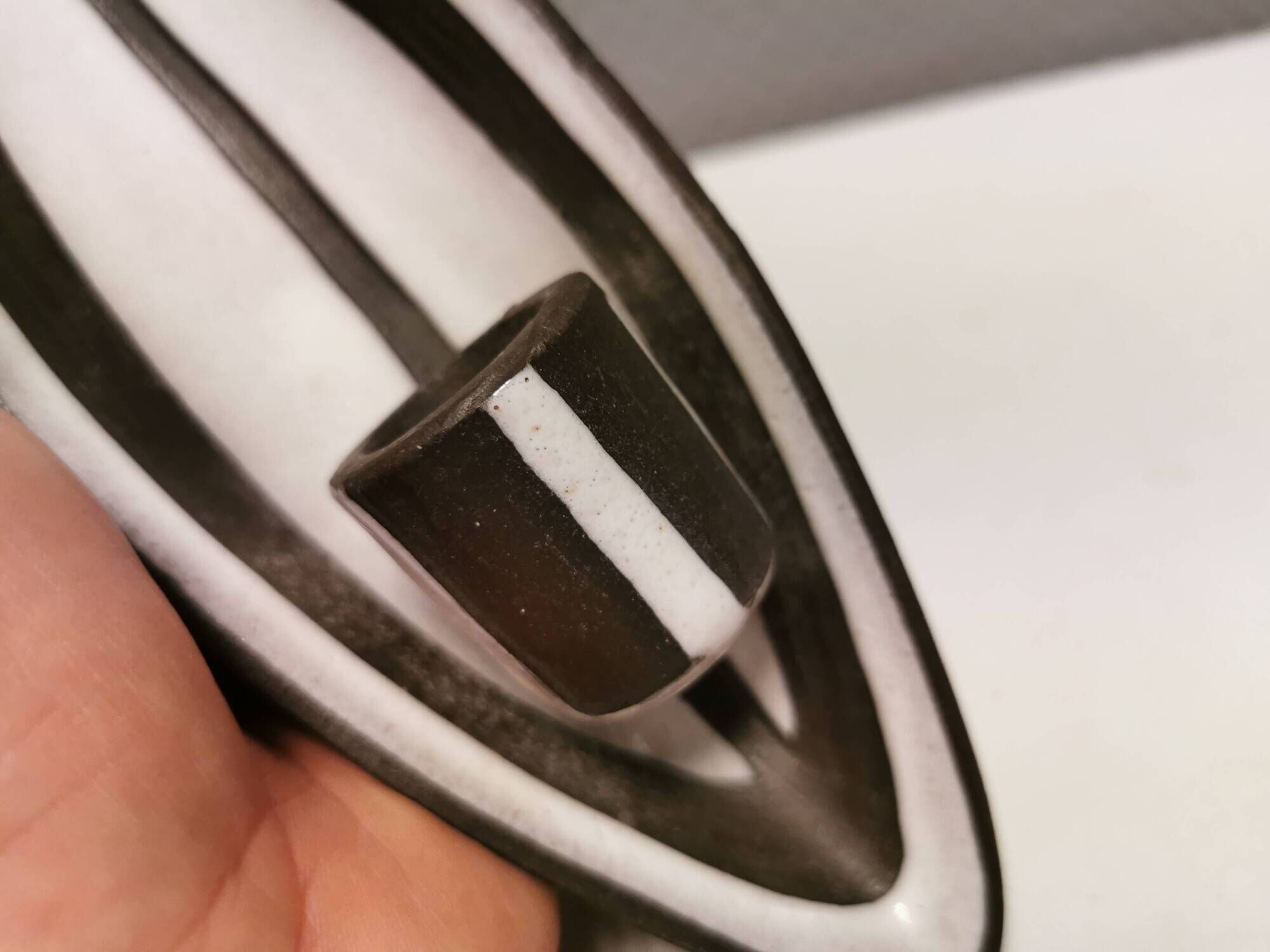 Wall-hung candle holder in the black series, made by Michael Andersen Bornholm Denmark 1960s