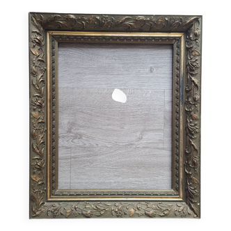 Old 19th century wooden frame with plaster sculpture
