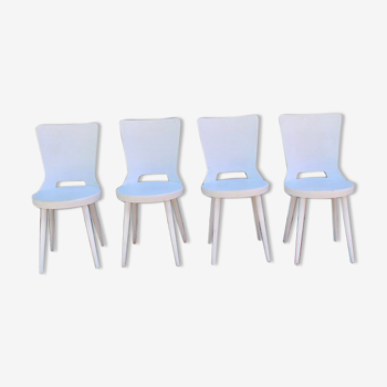 Series of 4 white wooden chairs