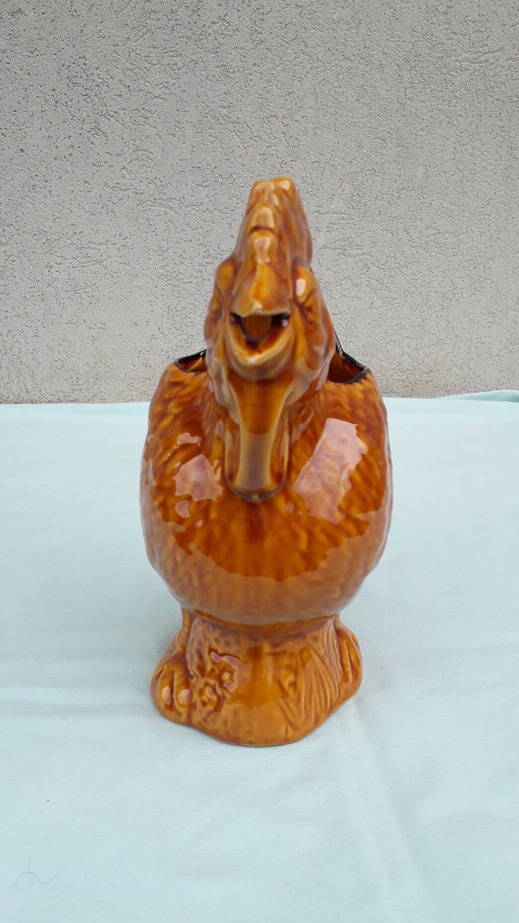 Rooster pitcher