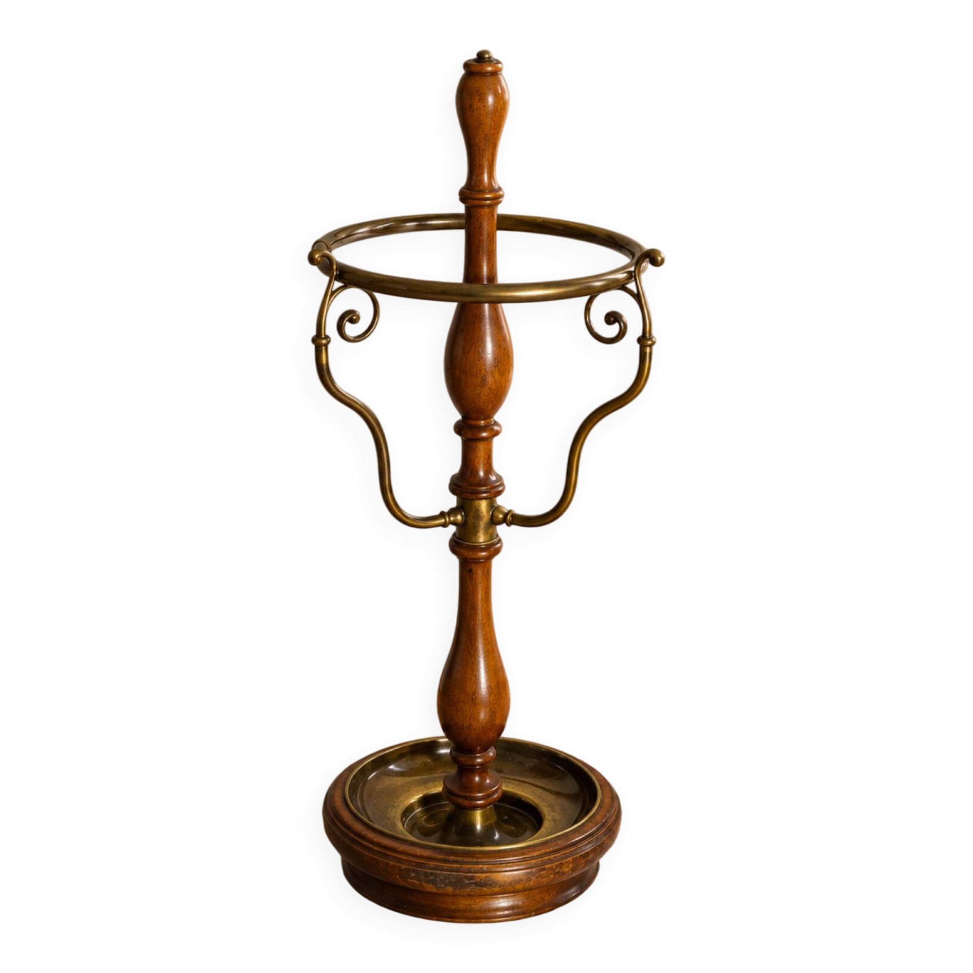 Umbrella stand and English-style wooden and brass canes, 20th century.