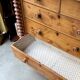 Support furniture, 6-drawer chest in turned pitch pine.