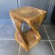 Stool no. 1 in solid raw walnut wood, carved from the mass, 1970.
