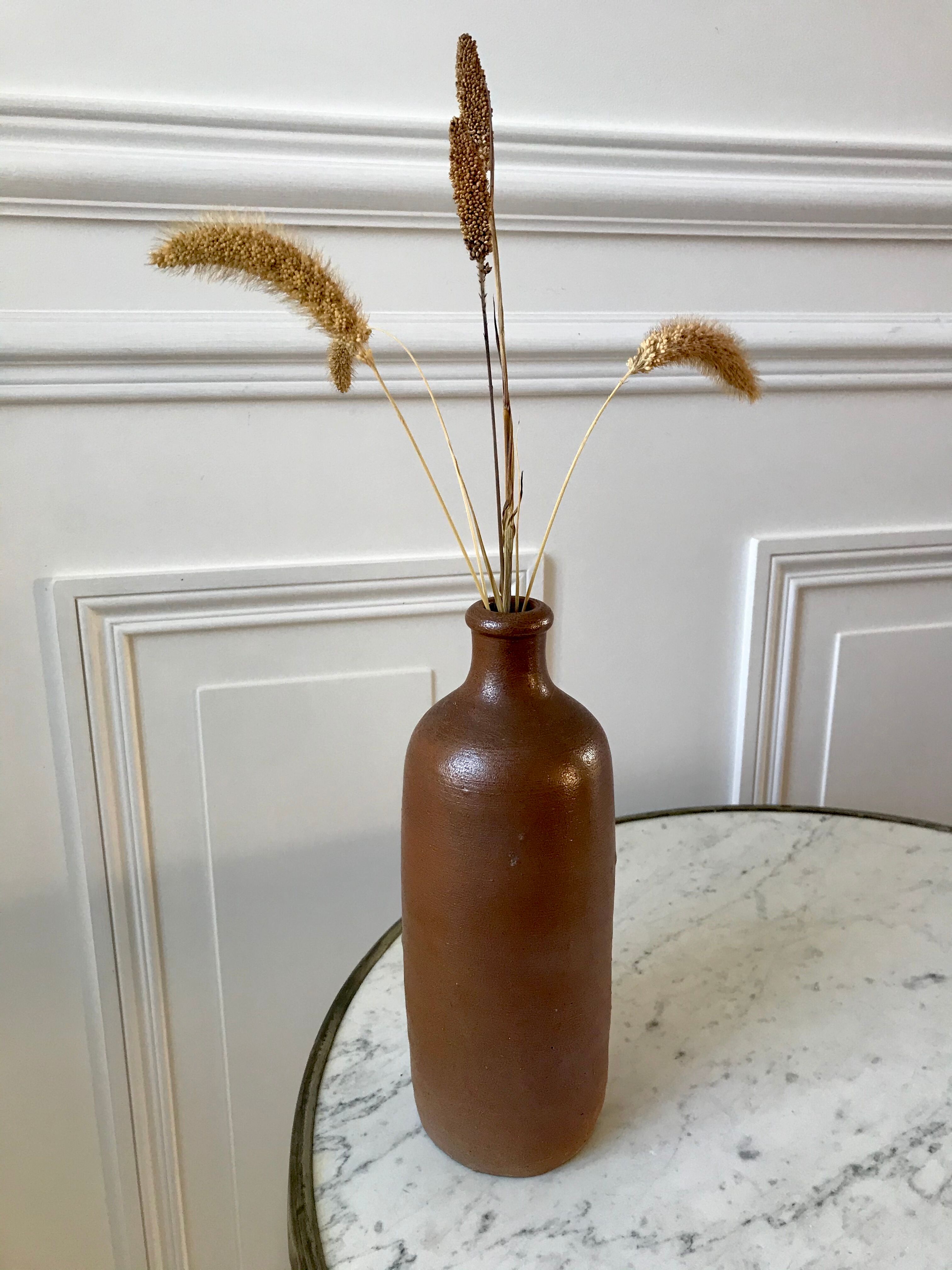 Stoneware bottle handmade early twentieth century