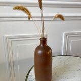 Stoneware bottle handmade early twentieth century