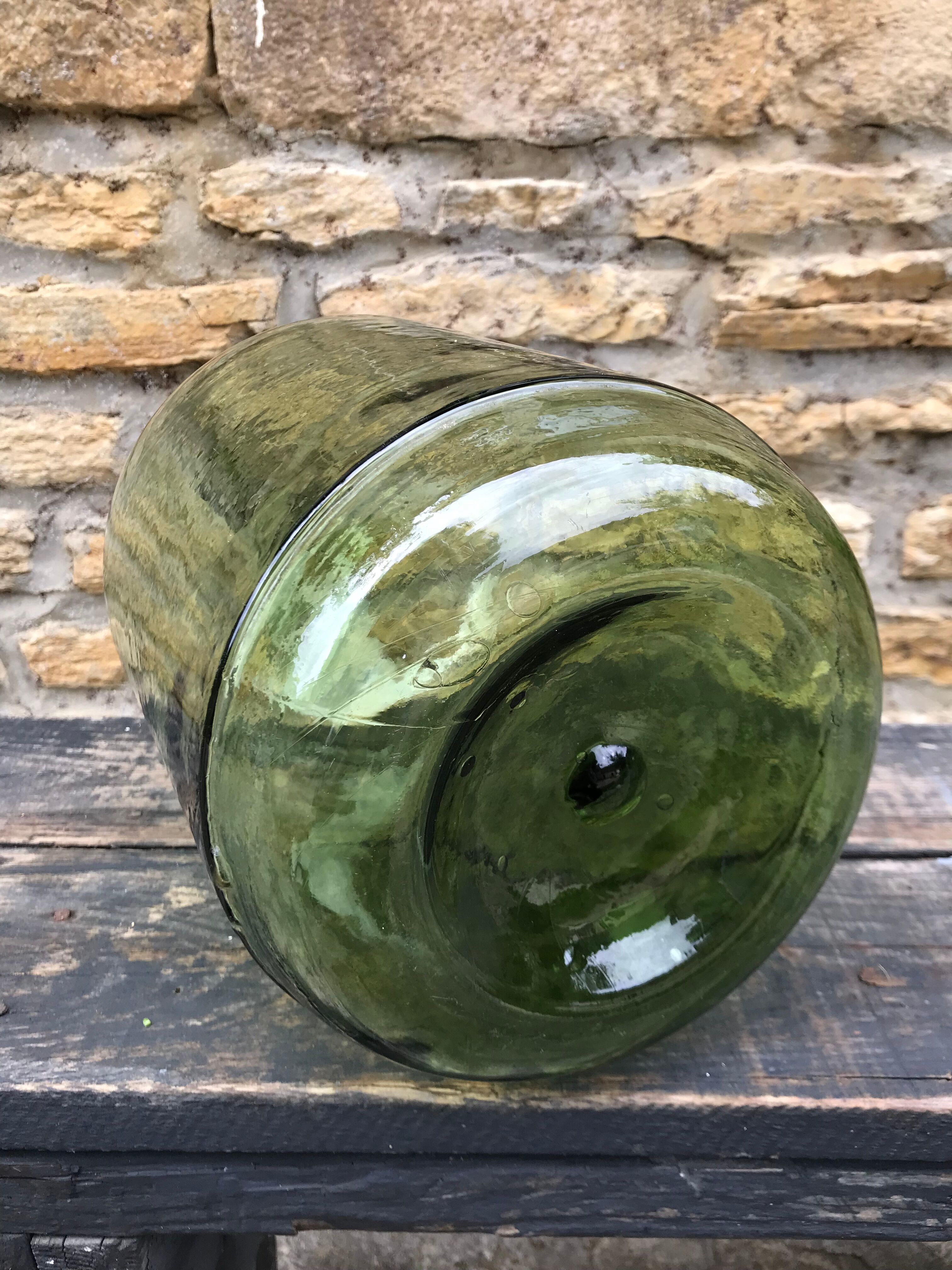 Green and oval demijohn