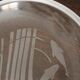 Hermès pair of glass plates with a dolphin pattern.
