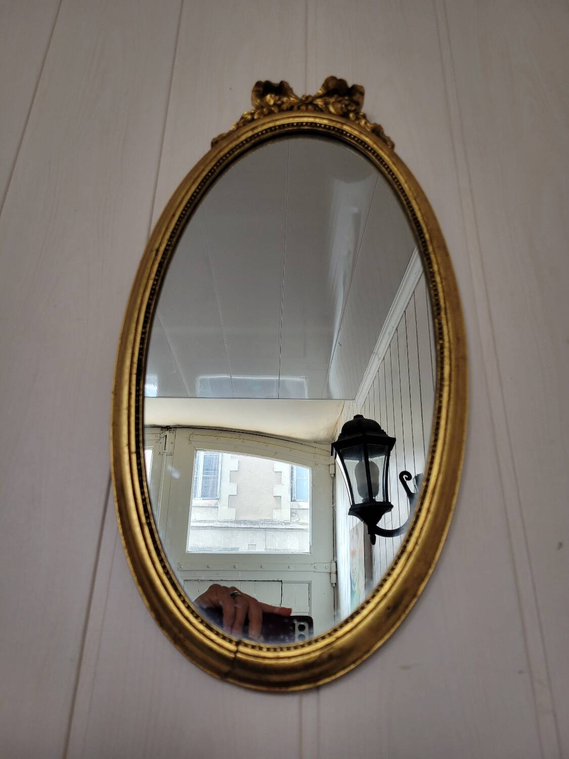 Louis XVI style oval mirror