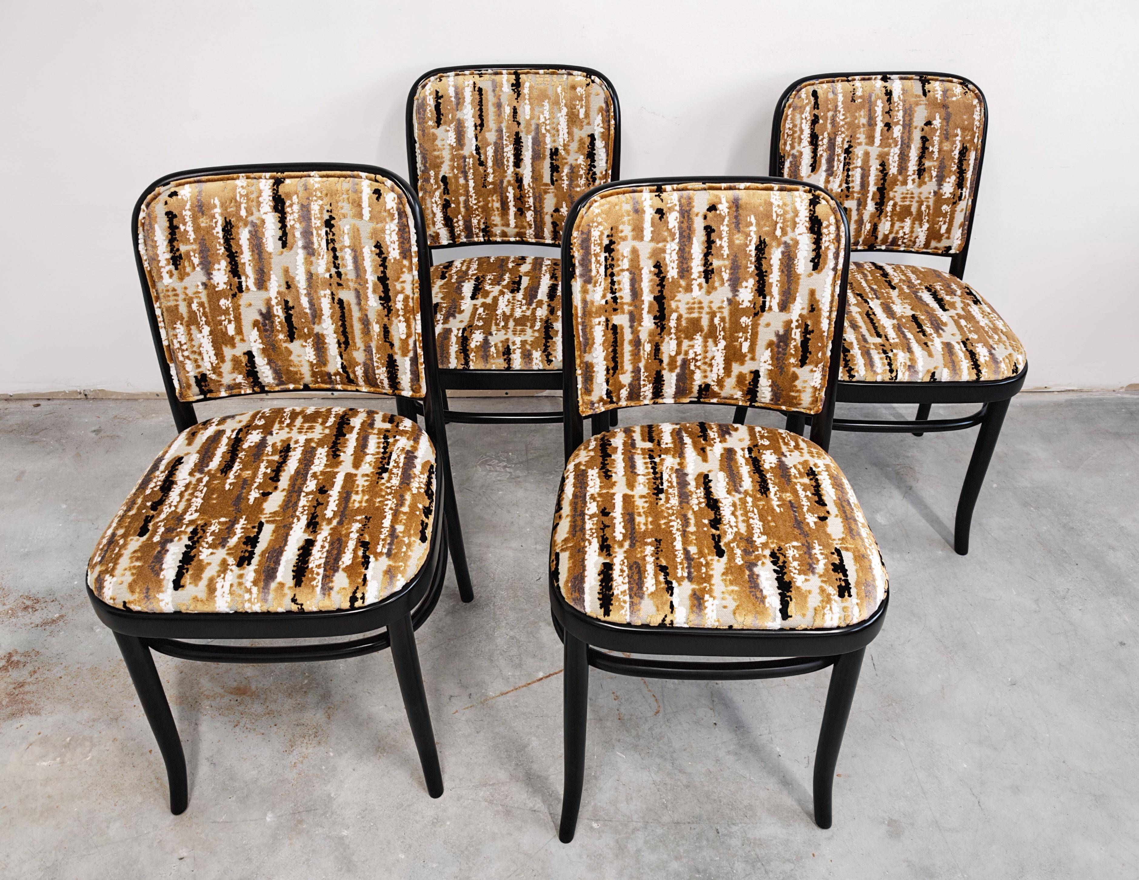 Set of 4 curved wood dining chairs by Josef Hoffmann for Mundus.
