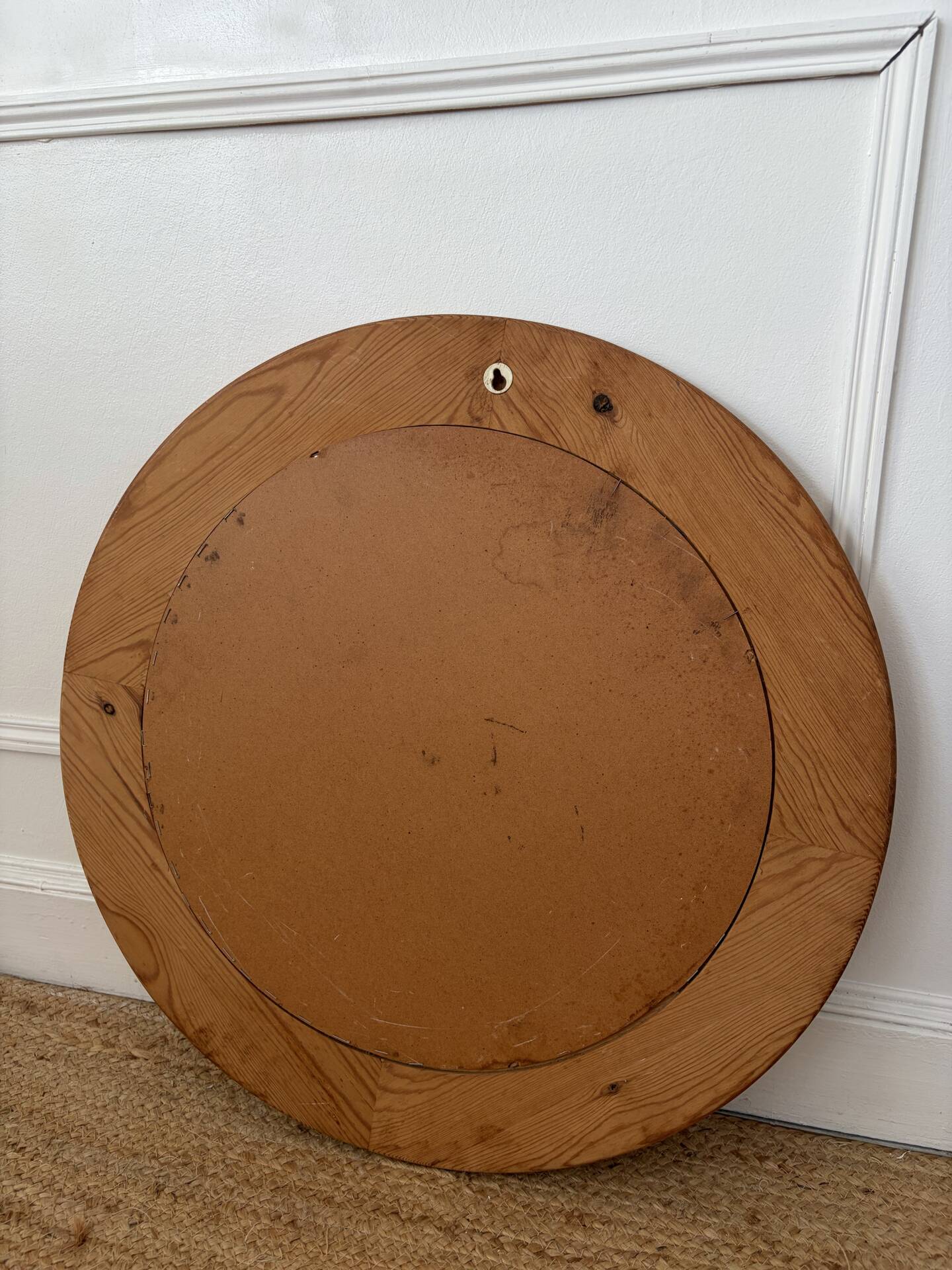 Round Scandinavian pine mirror from the 1970s.