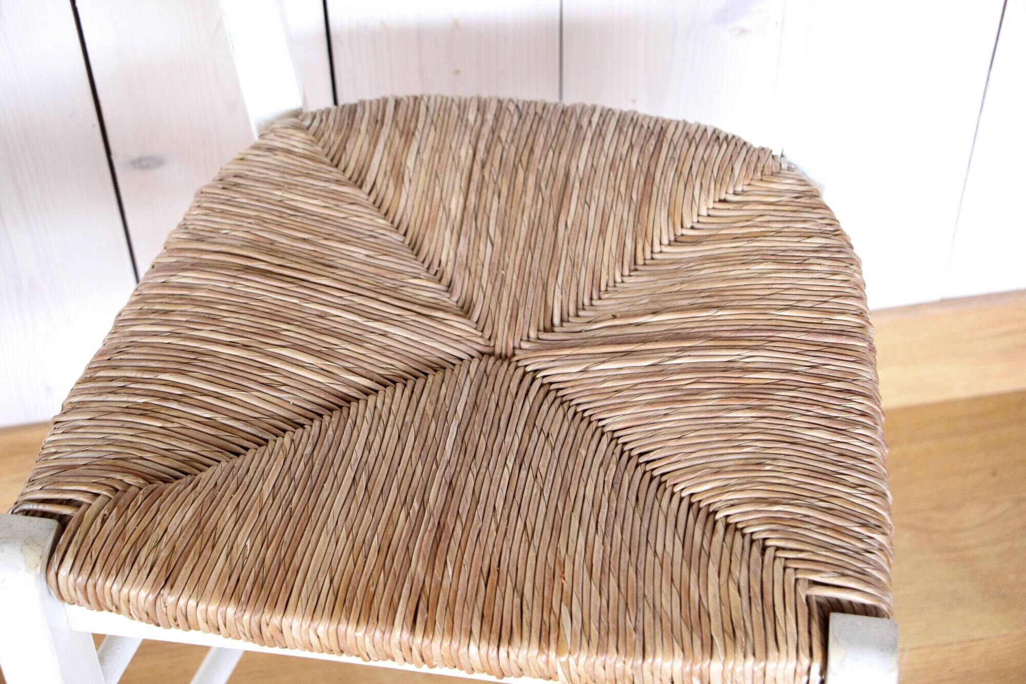 Pair of white rush chairs