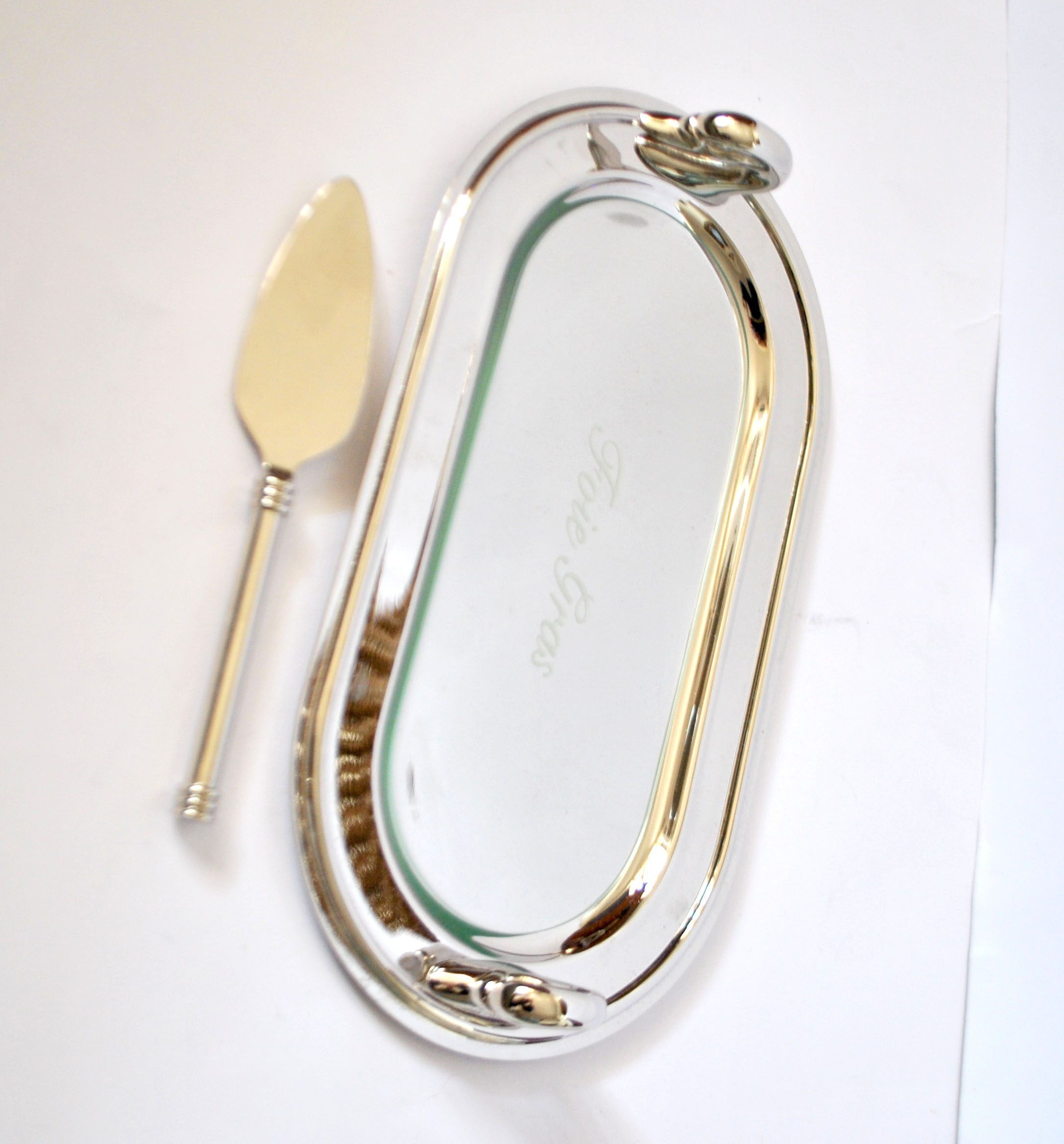 Vintage silver-plated foie gras platter with goose head decoration and serving spatula.