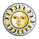 Decorative ceramic plate with sun face