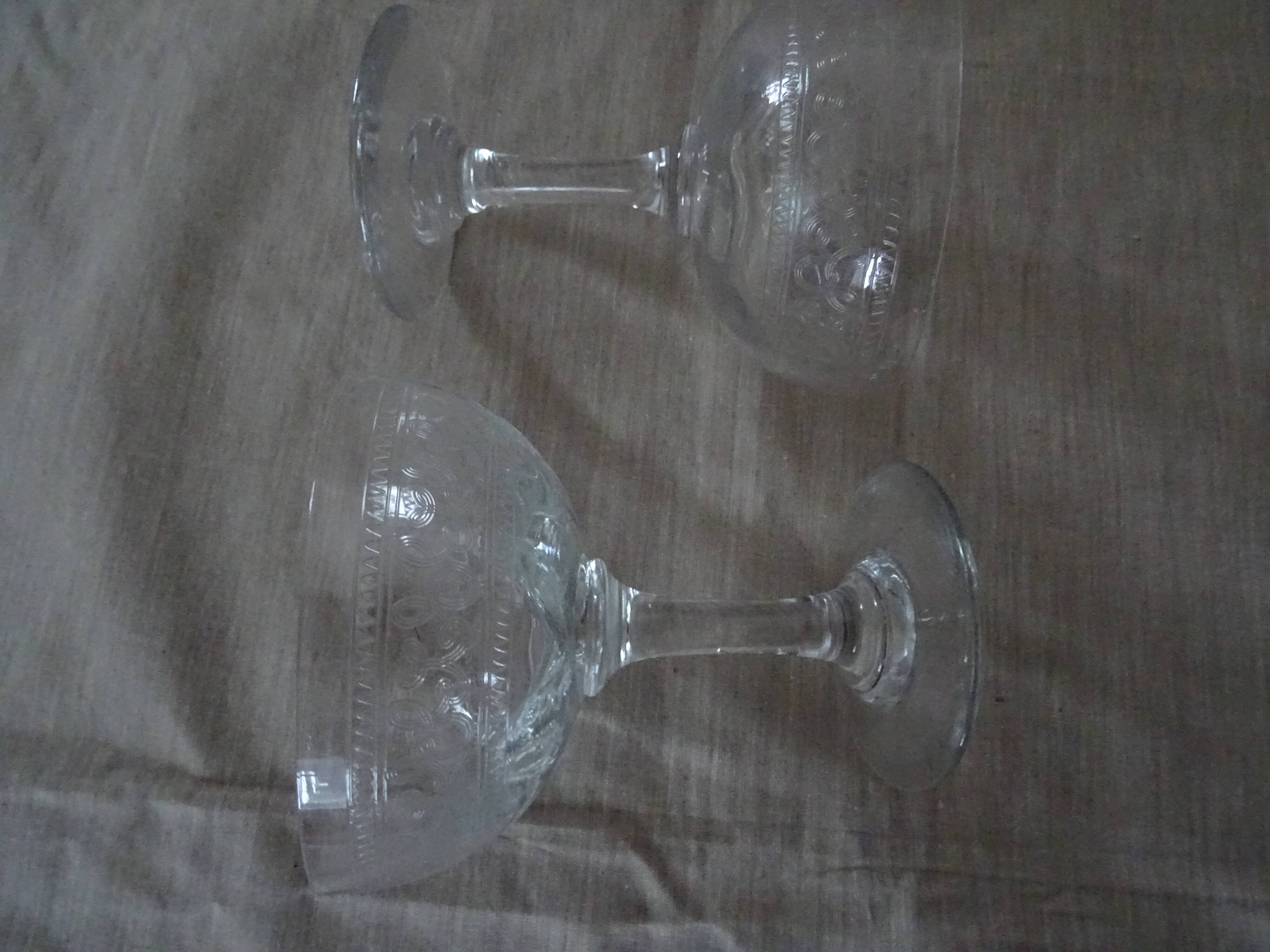 Pair of old crystal champagne glasses wide frieze right foot