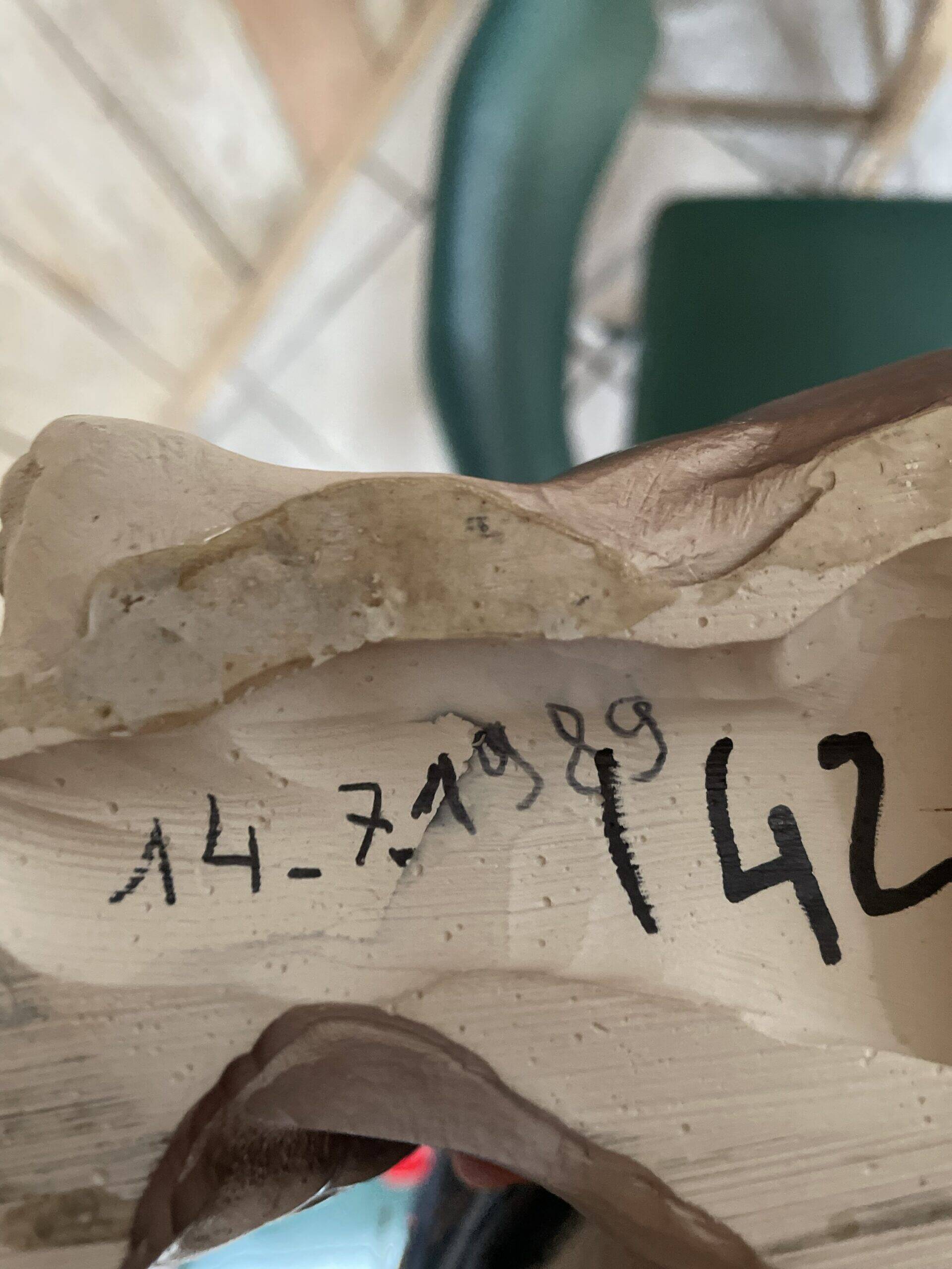 Ceramic dog statuette