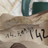 Ceramic dog statuette