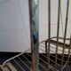 Tubular metal chair covered with gilding