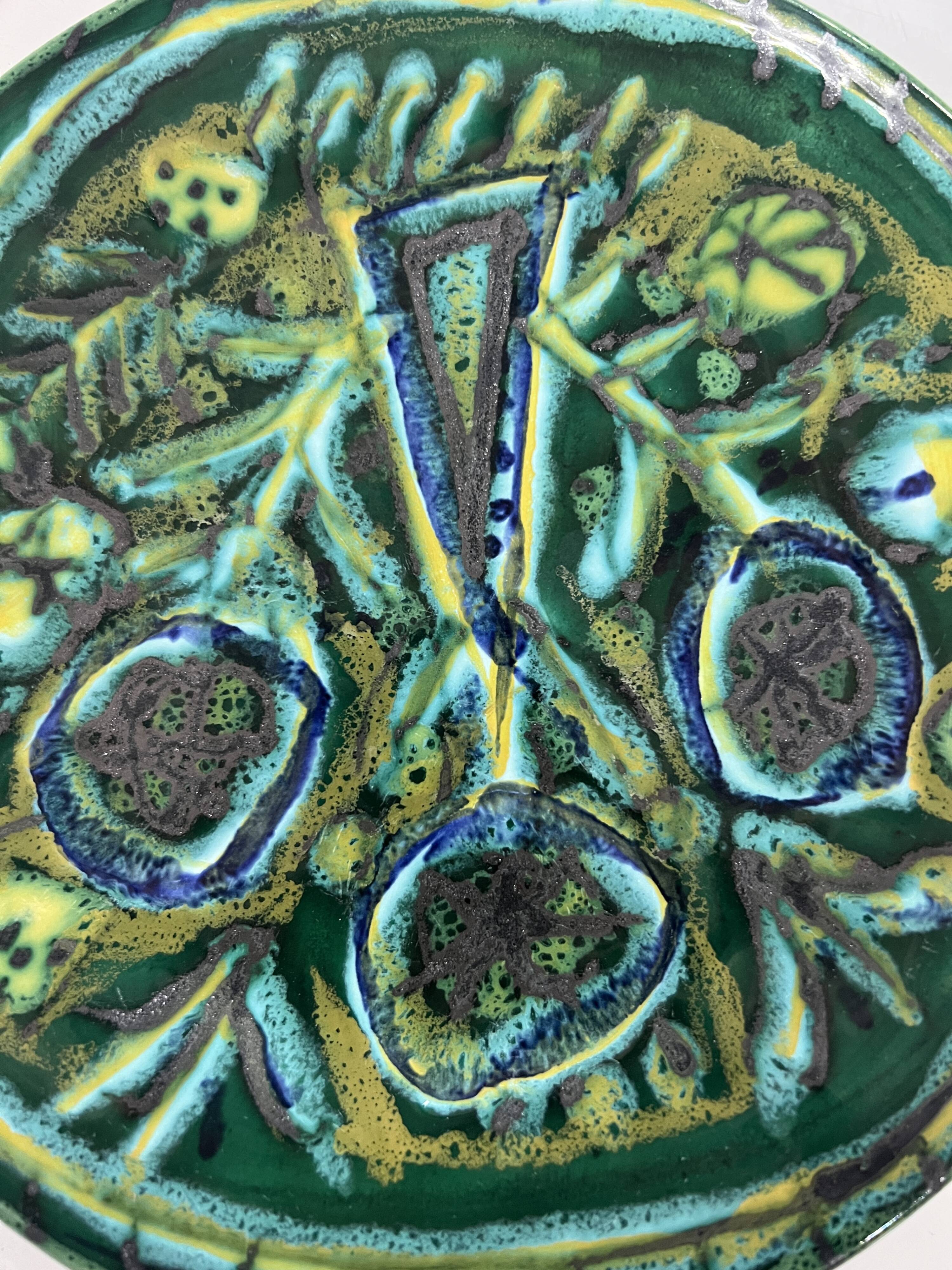 Ceramic plate signed Paul Yvain