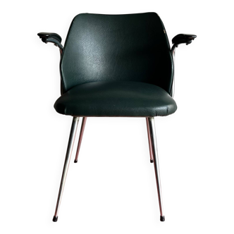 Vintage green faux leather and chrome armchair