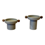 A pair of Scandinavian design candle holders.