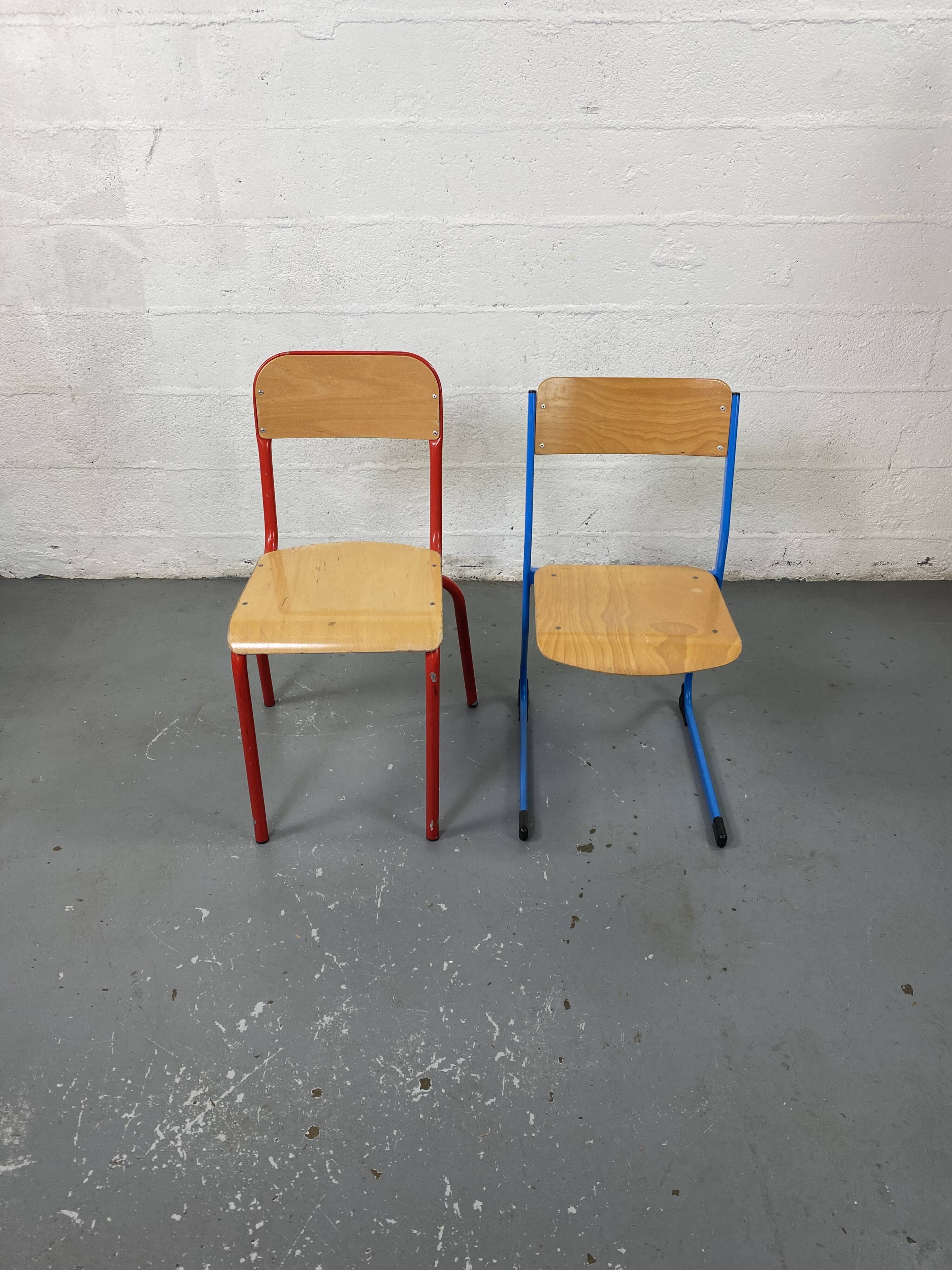 Set of 2 mismatched industrial school chairs