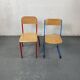 Set of 2 mismatched industrial school chairs