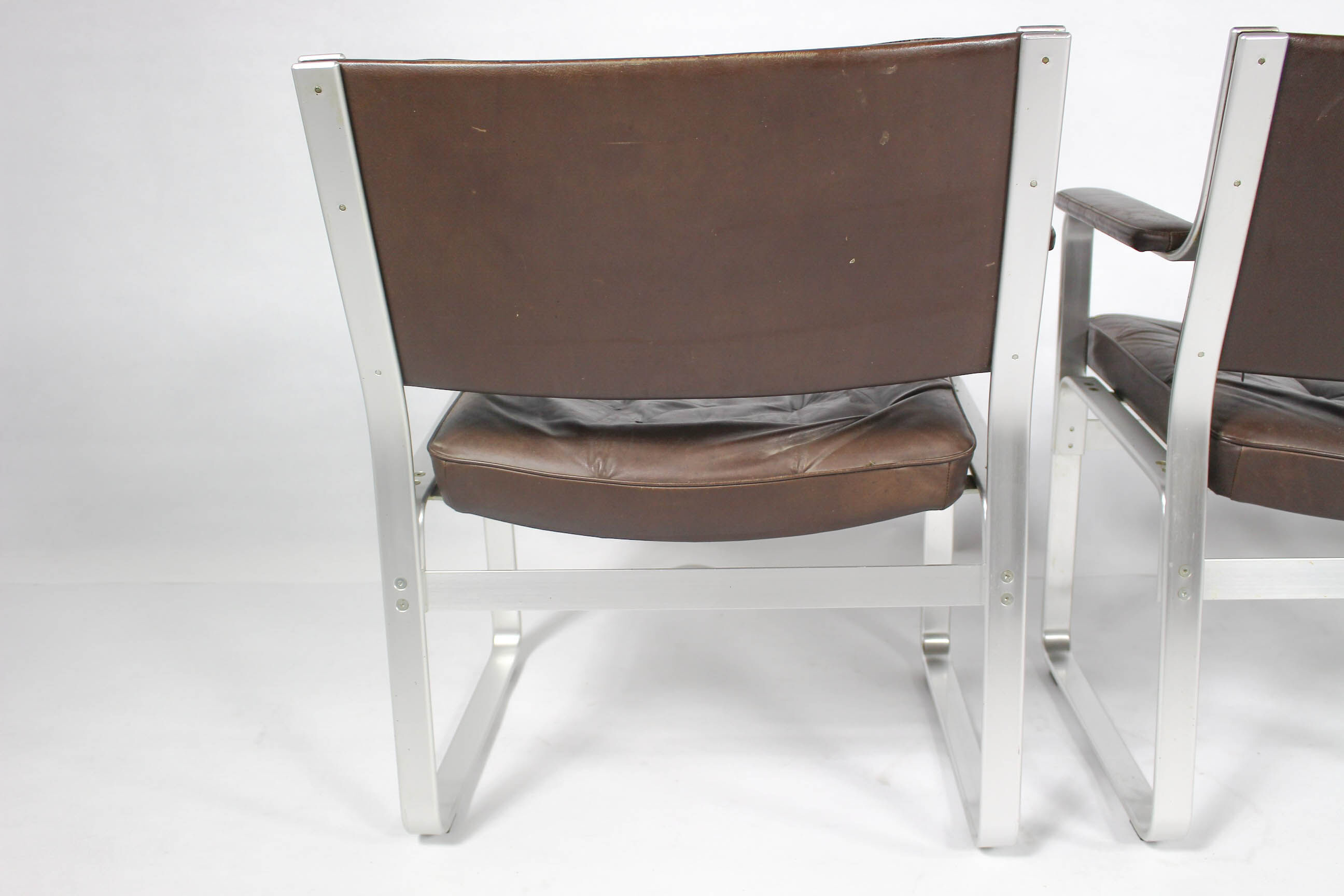 Swedish Mid Century Leather And Aluminum Armchairs By Karl Erik Ekselius For Joc Vetlanda, Set Of 4