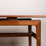 Large Danish teak coffee table with 1960 document rows.