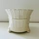 Tripod basket cache pot
