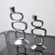 Pair of circle candlesticks by Matthew Hilton, England, 1980