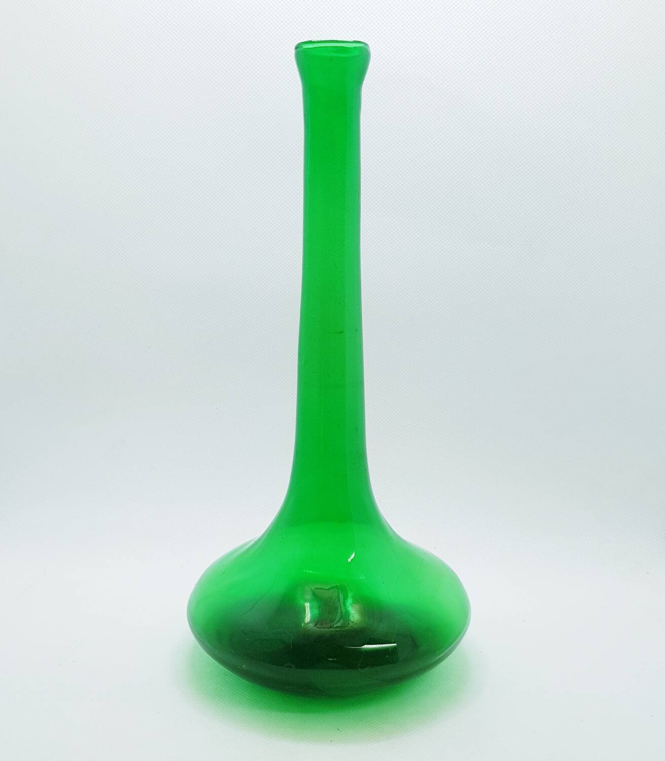 Tall green glass bud vase