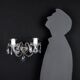 Antique wall light with 2 lights from the 1900s, featuring crystal bobeches and pendants.