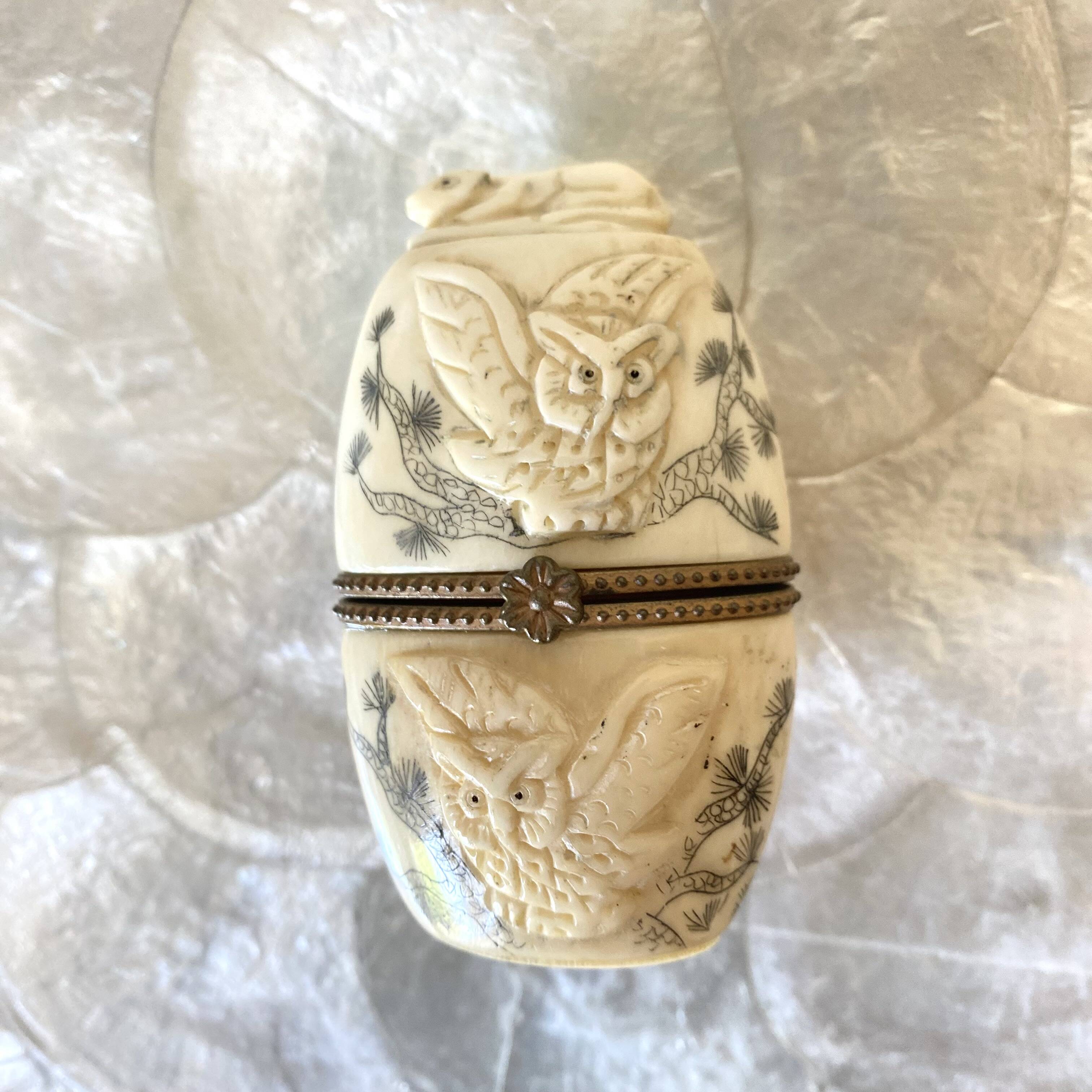 Ivory and brass owl and ermine box