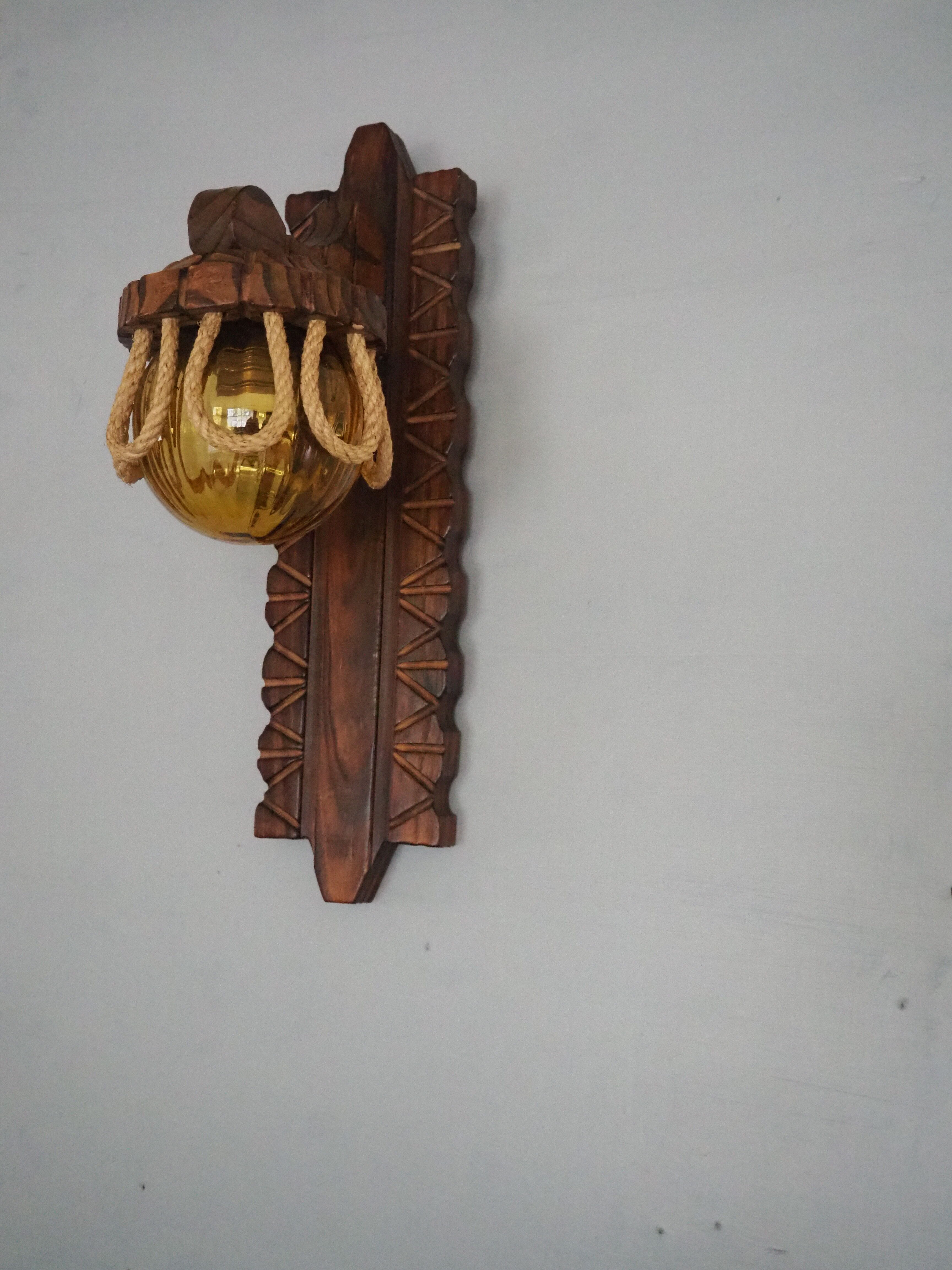 Sconce in wood and yellow glass ball from the 1960/1970