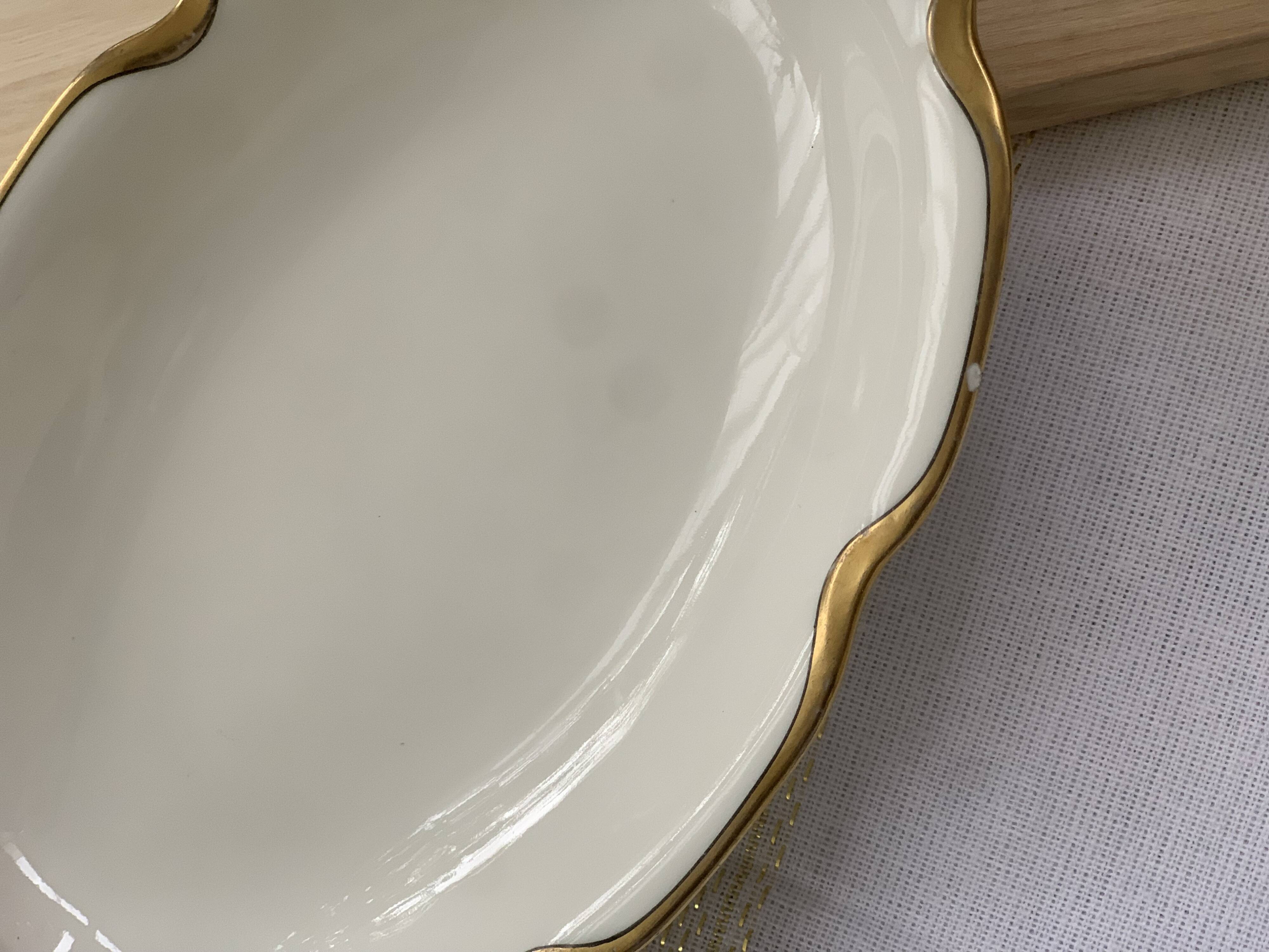Plate and its golden ravier rim