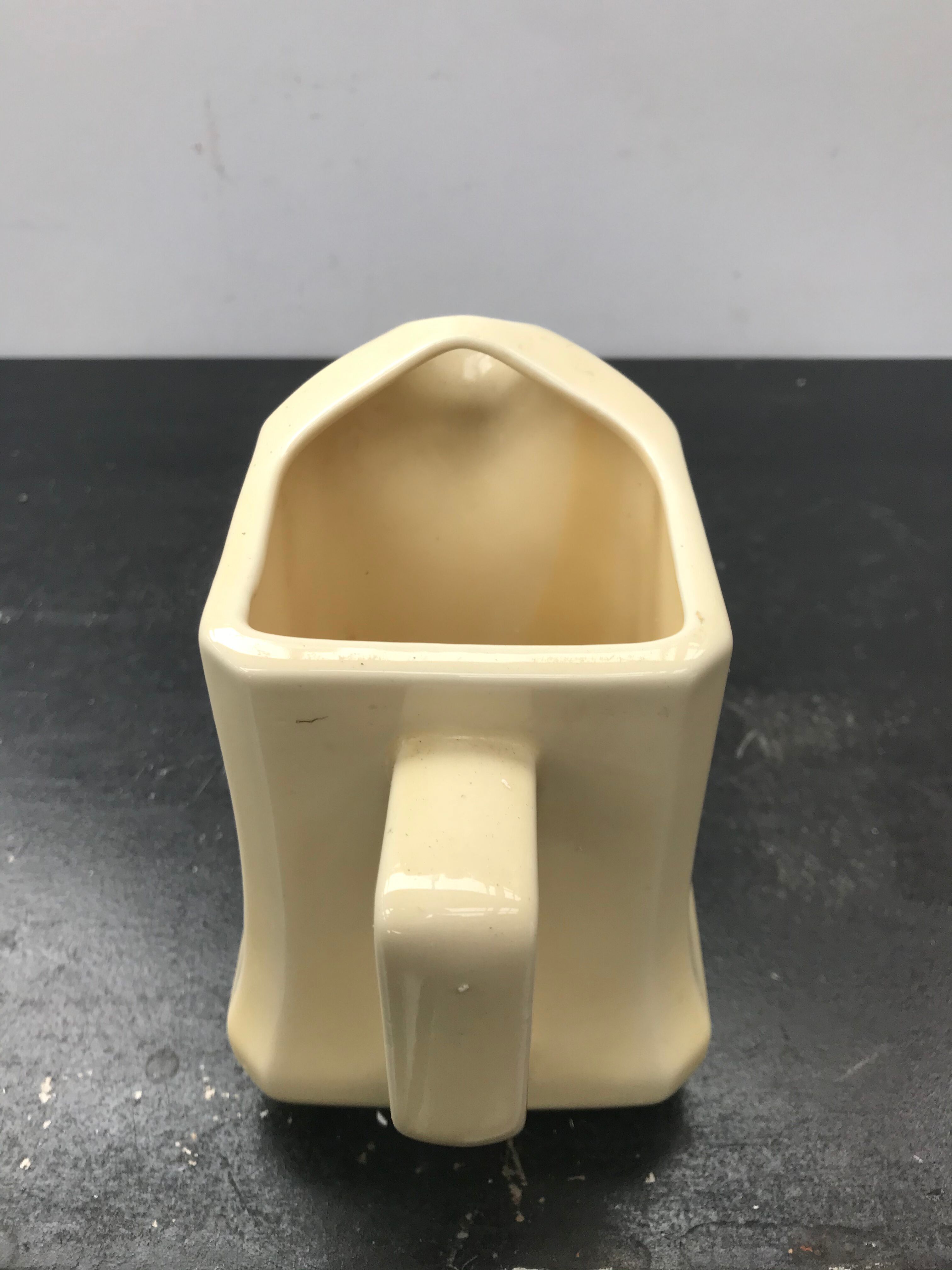 Former beige ceramic pitcher 70